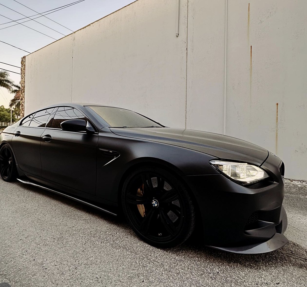 BMW M6 Gran Coupé in a matte black color change wrap by GCAT